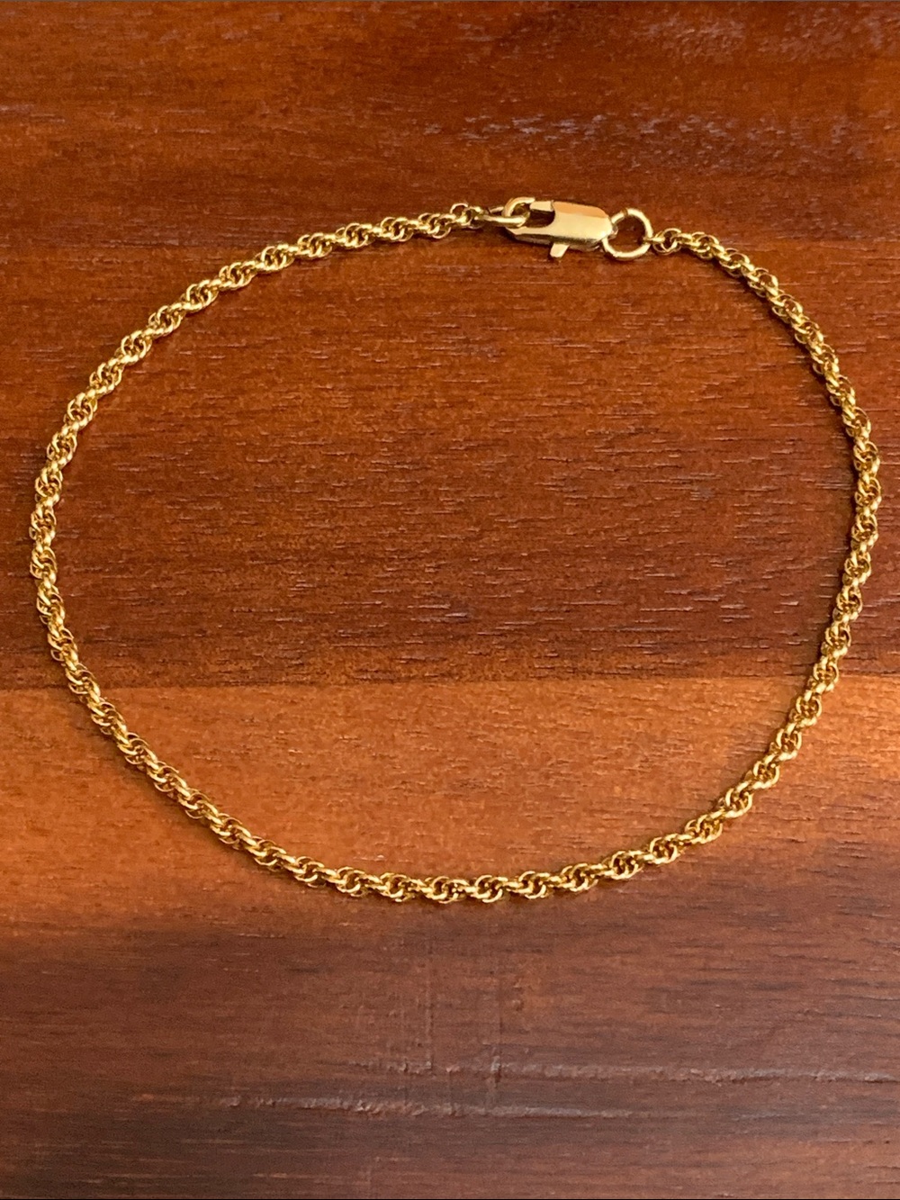 Very dainty gold tone rope chain bracelet